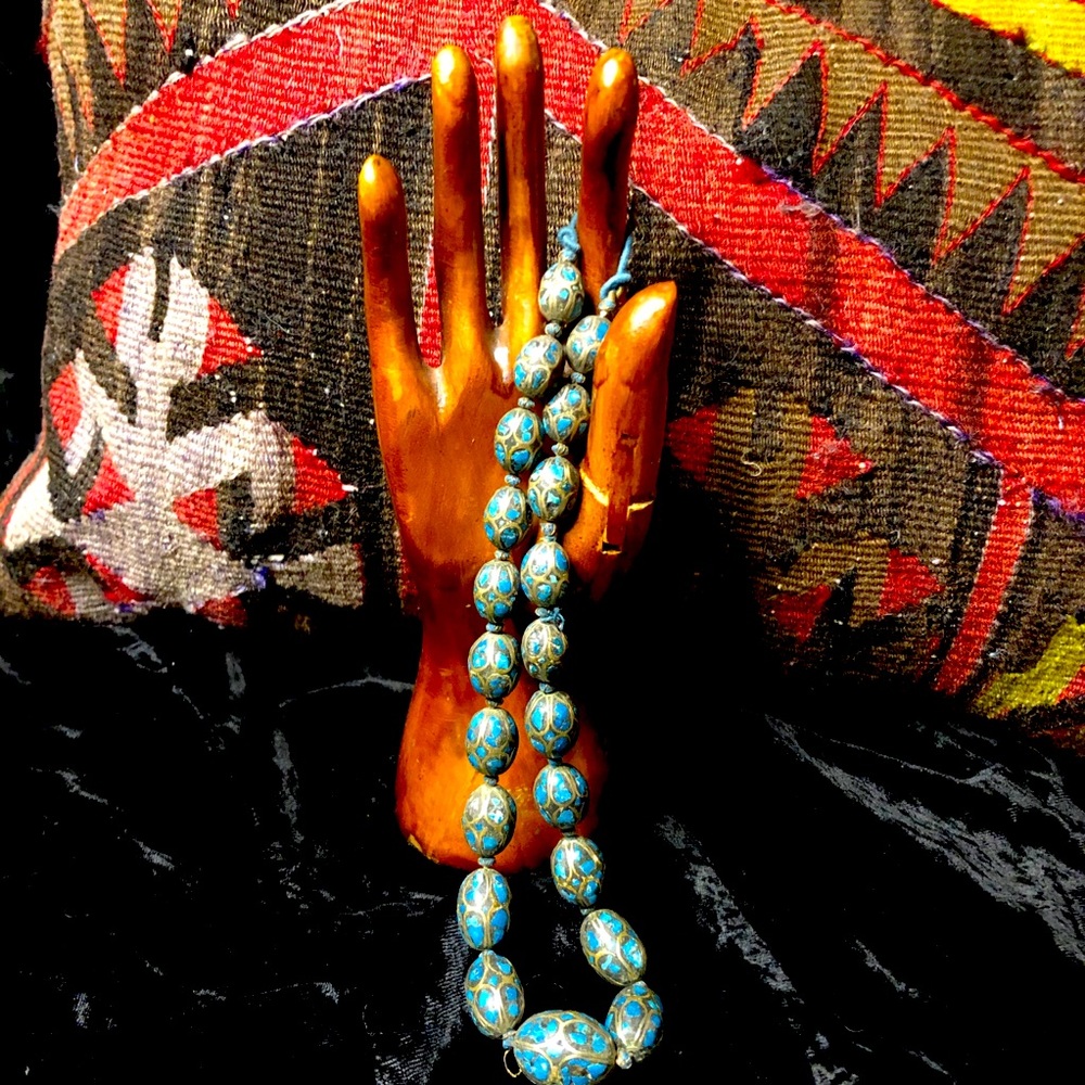 Turquoise tribal silver inlaid beads.